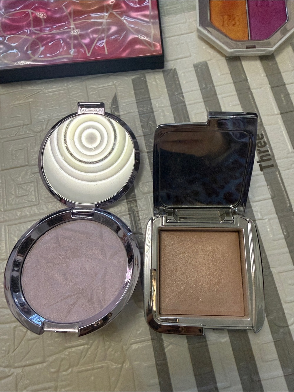 Becca Shimmery Lavender and Hourglaaa Ambient Highlighters